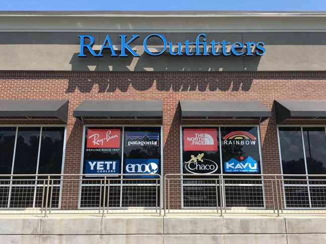 Window signage for a clothing chain in Kennesaw, Ga.